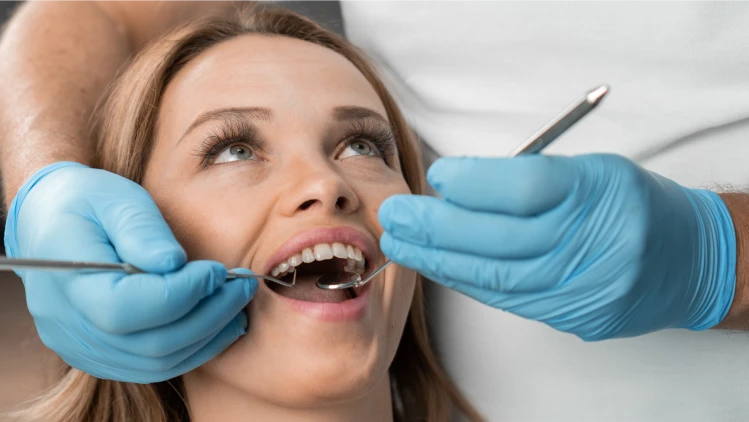 dentist examining a patient's teeth